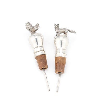 Lot 359 - TWO STERLING SILVER BOTTLE STOPPERS