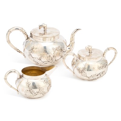 Lot 271 - A CHINESE EXPORT SILVER THREE-PIECE TEA SERVICE