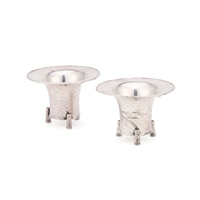 Lot 265 - A PAIR OF EARLY 20TH CENTURY JAPANESE SILVER TRIPOD VASES