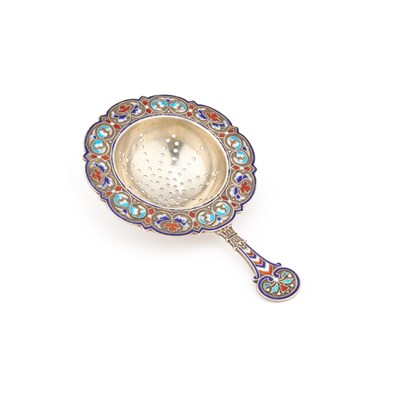 Lot 284 - A STERLING SILVER AND ENAMEL TEA STRAINER