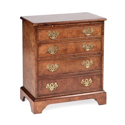 Lot 1010 - A GEORGIAN STYLE BURR ELM BACHELOR'S CHEST OF DRAWERS