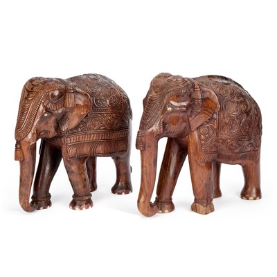 Lot 524 - A PAIR OF INDIAN CARVED WOOD ELEPHANTS
