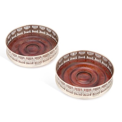 Lot 312 - A PAIR OF ELIZABETH II SILVER WINE COASTERS