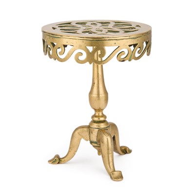 Lot 233 - A BRASS TRIVET