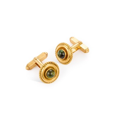 Lot 683 - A PAIR OF PERIDOT CUFFLINKS
