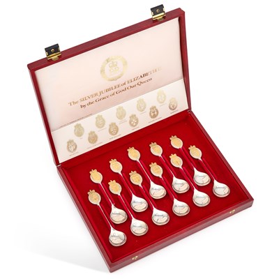 Lot 334 - A SET OF ELEVEN LIMITED EDITION PARCEL-GILT SILVER ROYAL COMMEMORATIVE SPOONS
