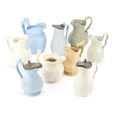 Lot 176 - A QUANTITY OF STAFFORDSHIRE RELIEF MOULDED JUGS
