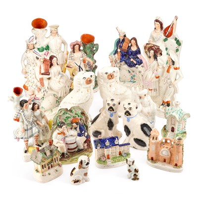 Lot 145 - A COLLECTION OF STAFFORDSHIRE POTTERY FIGURES