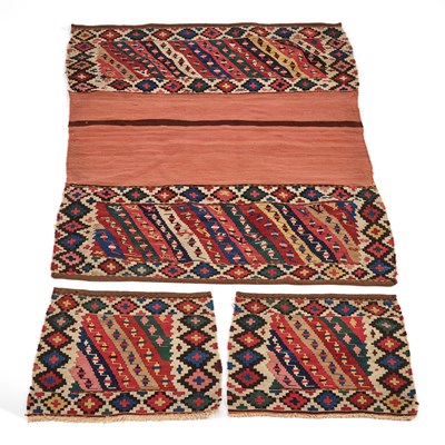 Lot 954 - A PERSIAN SADDLE BAG AND TWO BAG FACES