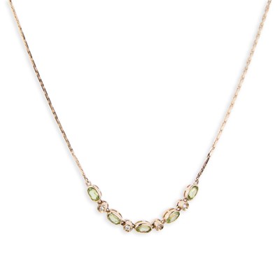 Lot 647 - A 9 CARAT GOLD PERIDOT AND DIAMOND NECKLACE