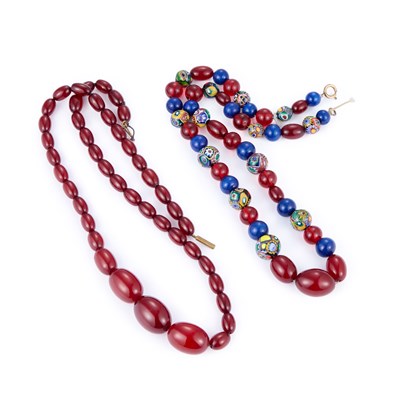 Lot 797 - A CHERRY AMBER BAKELITE BEAD NECKLACE