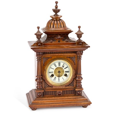 Lot 982 - A LATE 19TH CENTURY WALNUT MANTEL CLOCK