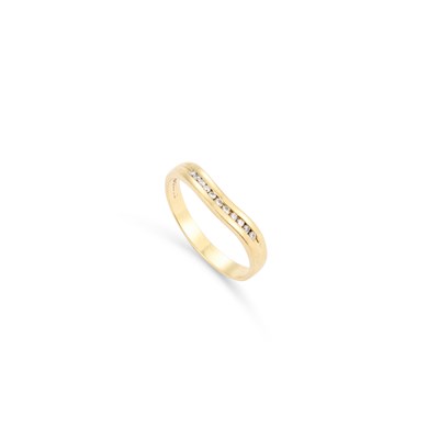 Lot 745 - AN 18 CARAT GOLD DIAMOND HALF HOOP RING