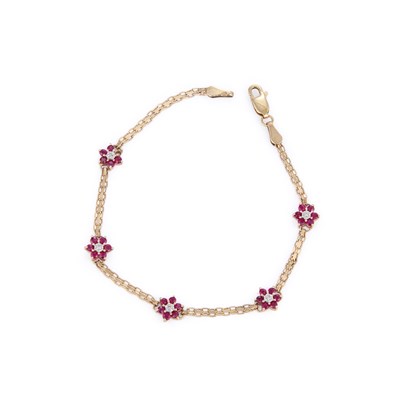 Lot 692 - A 9 CARAT GOLD RUBY AND DIAMOND CLUSTER BRACELET