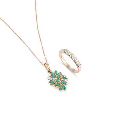Lot 670 - A 9 CARAT GOLD DIAMOND FIVE STONE RING AND AN EMERALD AND DIAMOND PENDANT ON CHAIN
