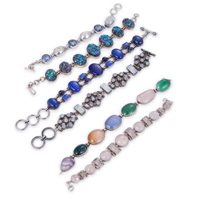 Lot 728 - A GROUP OF SILVER GEM-SET BRACELETS