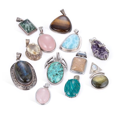Lot 681 - A GROUP OF GEM-SET SILVER PENDANTS