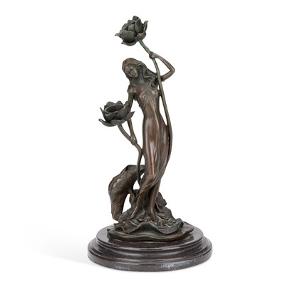 Lot 850 - AN ART NOUVEAU STYLE BRONZED CANDLESTICK