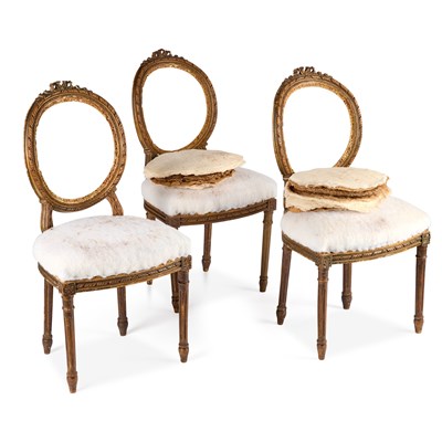 Lot 1072 - THREE FRENCH LOUIS XVI STYLE CARVED OVAL-BACK CHAIRS