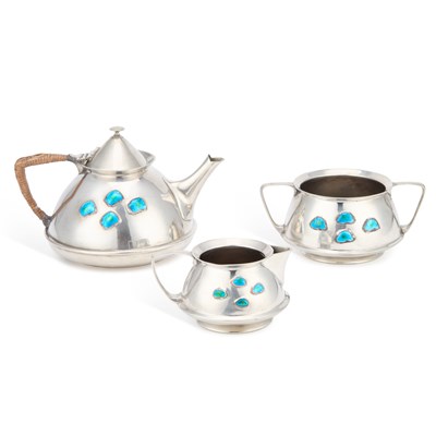 Lot 244 - ARCHIBALD KNOX (1864-1933) FOR LIBERTY & CO, A THREE-PIECE TUDRIC PEWTER AND ENAMEL TEA SERVICE