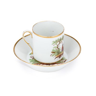 Lot 174 - AN AMSTEL PORCELAIN COFFEE CAN AND SAUCER