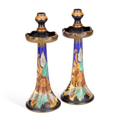 Lot 136 - A PAIR OF GOUDA POTTERY CANDLESTICKS