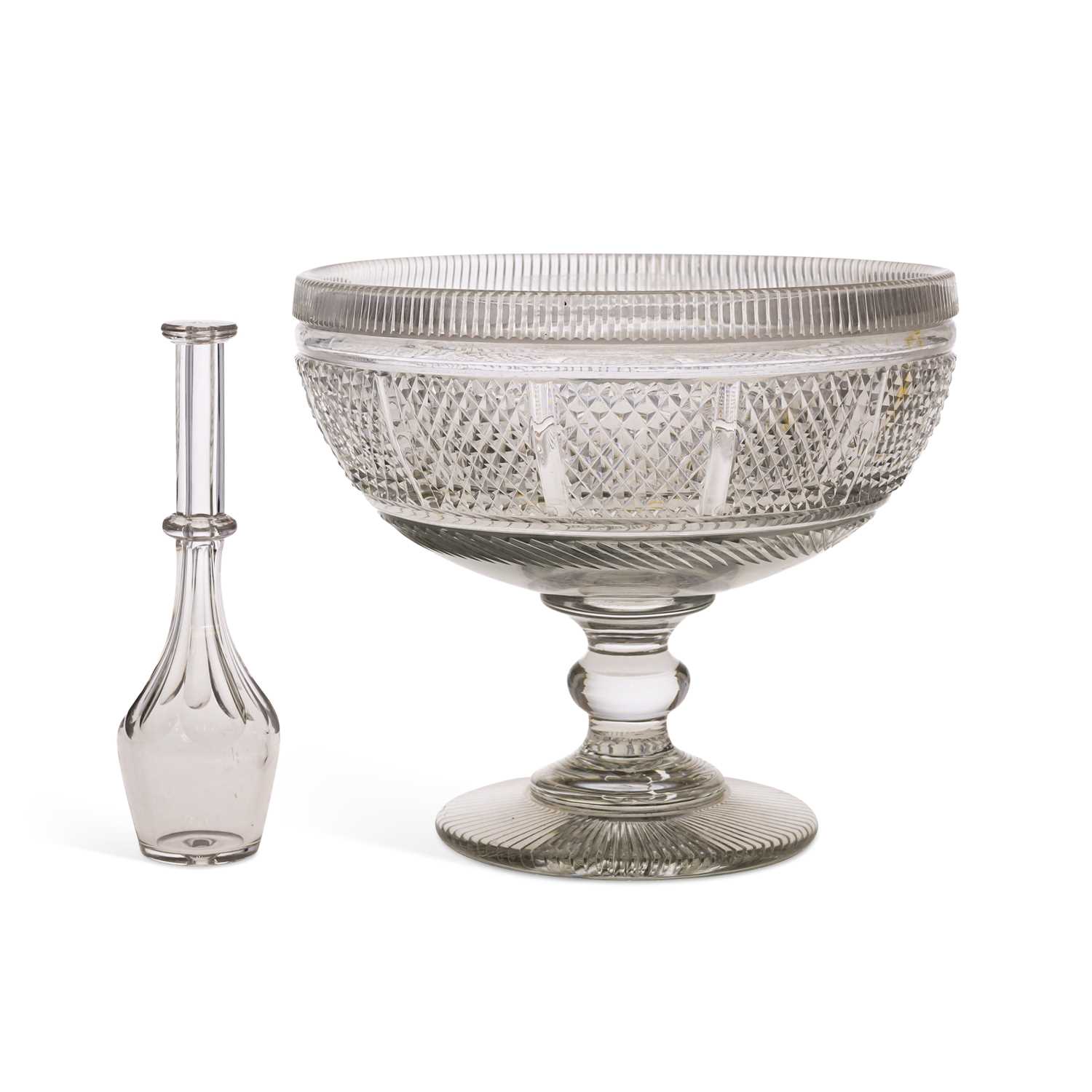 Lot 42 - A GEORGIAN CUT-GLASS PUNCH BOWL AND TODDY LIFTER
