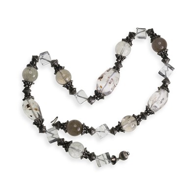 Lot 609 - A ROCK CRYSTAL AND RUTILATED QUARTZ BEAD NECKLACE