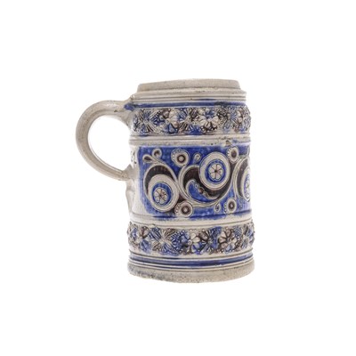 Lot 125 - A GERMAN WESTERWALD POTTERY MUG