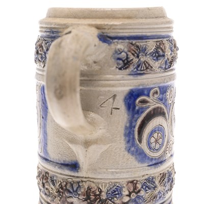 Lot 125 - A GERMAN WESTERWALD POTTERY MUG