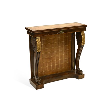 Lot 1096 - A REGENCY PARCEL-GILT, LEATHER-INSET AND ROSEWOOD CONSOLE TABLE