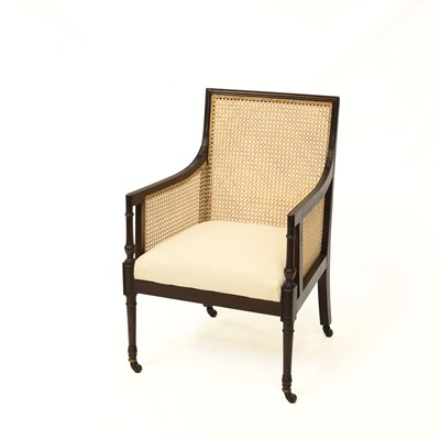 Lot 1086 - A 19TH CENTURY MAHOGANY CANED BERGÈRE ARMCHAIR