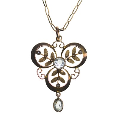 Lot 763 - AN EDWARDIAN 9 CARAT GOLD AQUAMARINE AND SEED PEARL PENDANT ON CHAIN