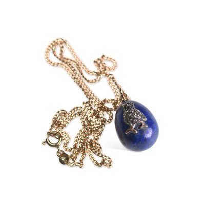 Lot 742 - A RUSSIAN LAPIS LAZULI AND DIAMOND EGG PENDANT ON CHAIN
