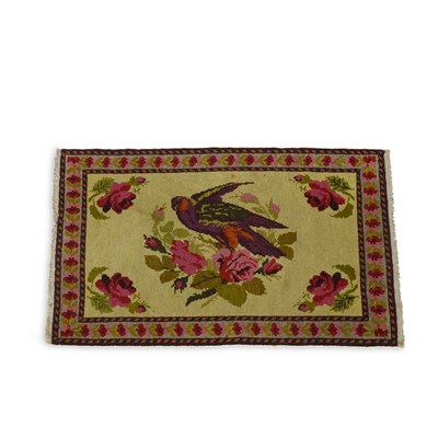 Lot 1024 - A SMALL WOOL RUG IN THE CHINESE TASTE