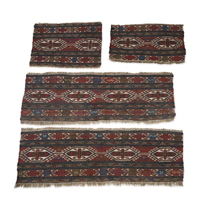 Lot 1027 - FOUR CAUCASIAN BAG FACES AND TENT HANGINGS