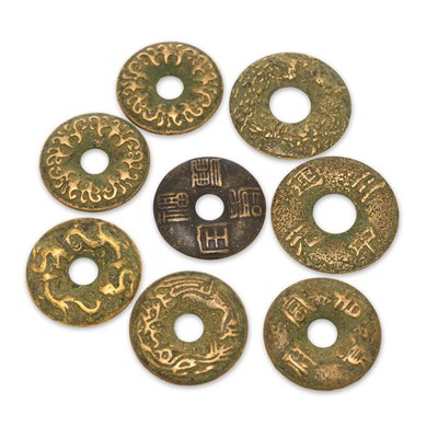 Lot 520 - A COLLECTION OF EIGHT CHINESE BRONZE CASH-TYPE CHARMS