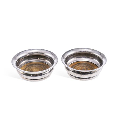 Lot 295 - A PAIR OF ELIZABETH II SILVER WINE COASTERS