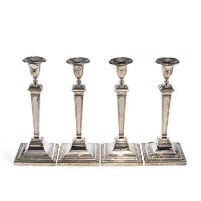 Lot 435 - A SET OF FOUR GEORGE III SILVER CANDLESTICKS