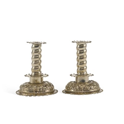 Lot 410 - A PAIR OF VICTORIAN CHASED SILVER CANDLESTICKS