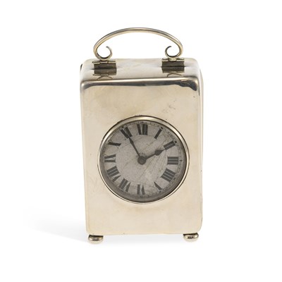 Lot 300 - AN EDWARDIAN SILVER-CASED DESK CLOCK