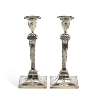 Lot 409 - A PAIR OF LATE VICTORIAN LARGE SILVER CANDLESTICKS