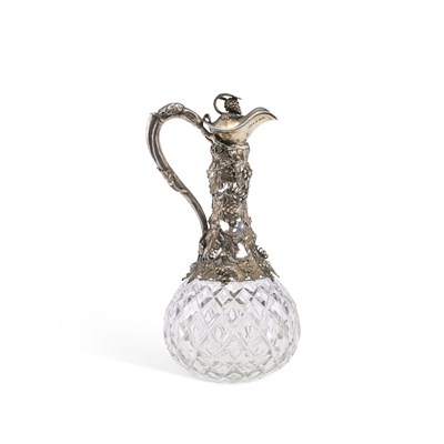 Lot 396 - A VICTORIAN SILVER MOUNTED CUT-GLASS CLARET JUG