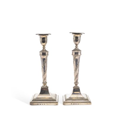 Lot 421 - A MATCHED PAIR OF GEORGE III SILVER CANDLESTICKS