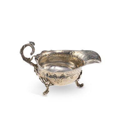 Lot 440 - A GEORGE II SILVER CREAM BOAT