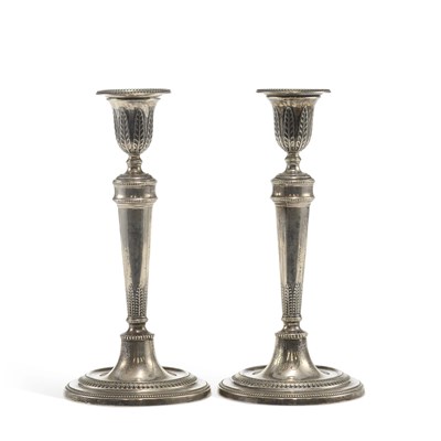Lot 353 - A PAIR OF GEORGE V SILVER CANDLESTICKS