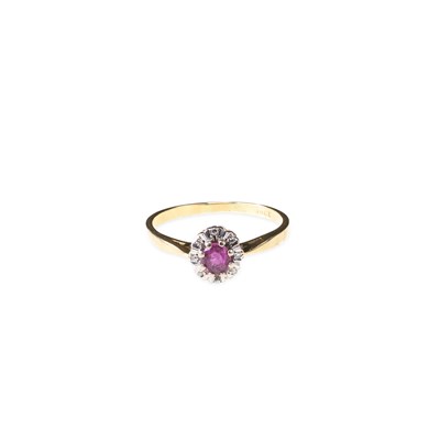 Lot 664 - A RUBY AND DIAMOND CLUSTER RING