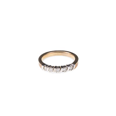 Lot 699 - A DIAMOND HALF HOOP RING