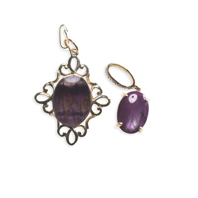 Lot 656 - TWO 9 CARAT GOLD GEM-SET PENDANTS