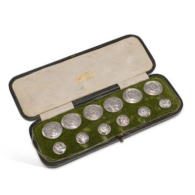 Lot 287 - A CASED SET OF TWELVE LATE VICTORIAN SILVER BUTTONS